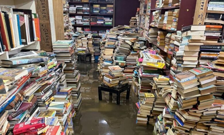 Rainwater floods Bookworm store on Church Street